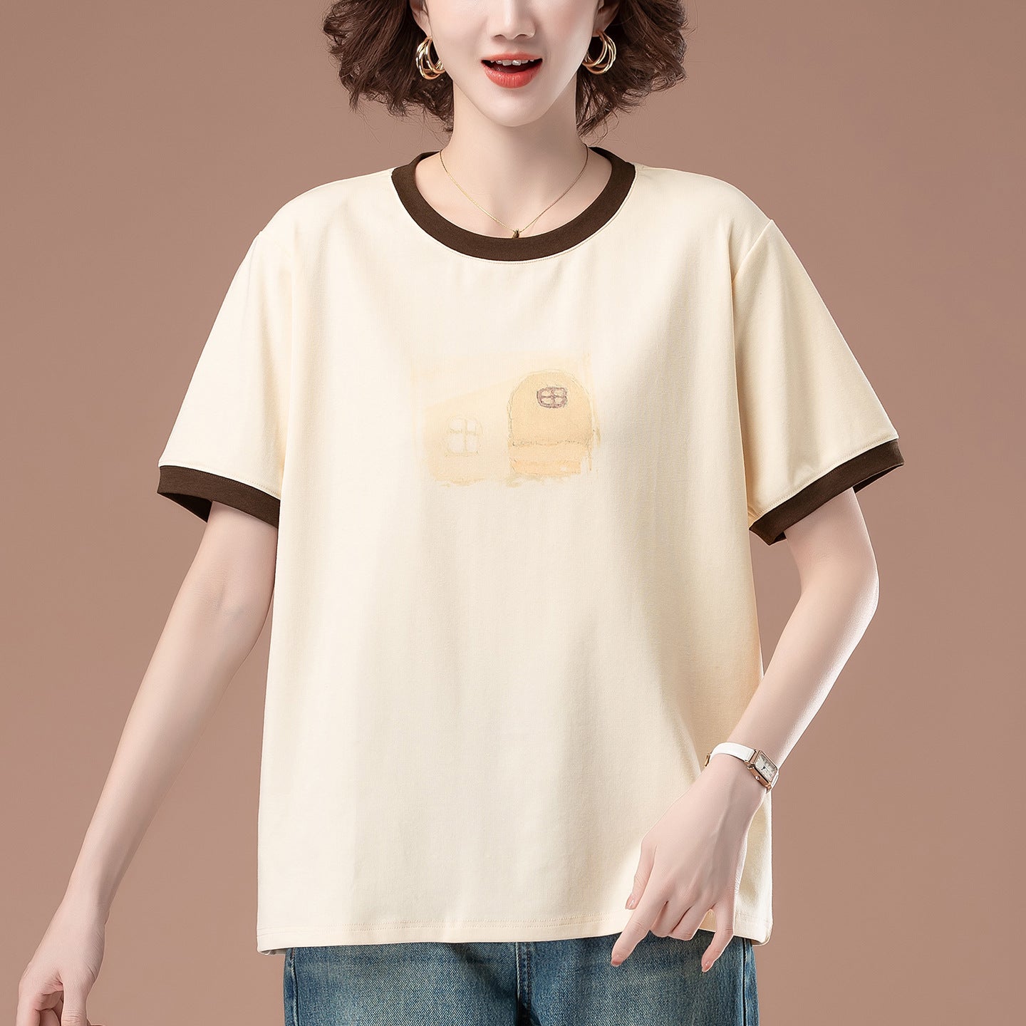 Back view of women's loose apricot short sleeve t-shirt relaxed fit streetwear style | TeenStylo