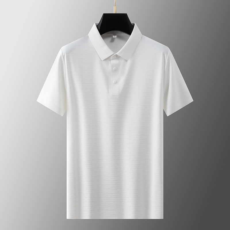 Man wearing white short sleeve polo shirt in casual streetwear style, urban lifestyle look | TeenStylo