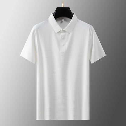 Man wearing white short sleeve polo shirt in casual streetwear style, urban lifestyle look | TeenStylo