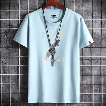 Man wearing yellow anime goth graphic T-shirt in urban streetwear style, Y2K Harajuku fashion look | TeenStylo