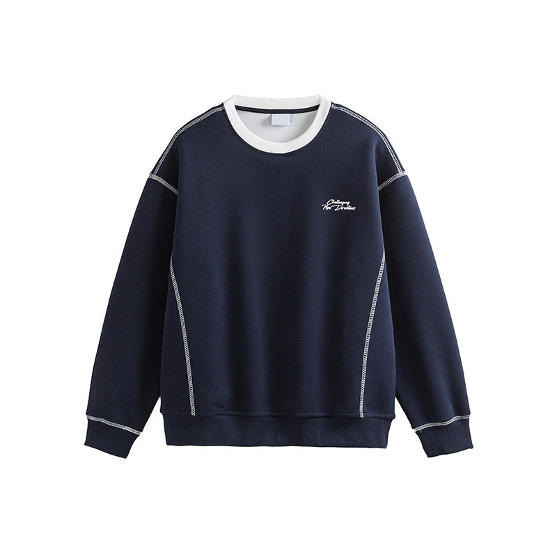 Navy blue men's sweatshirt with embroidered design, streetwear style lifestyle shot | TeenStylo