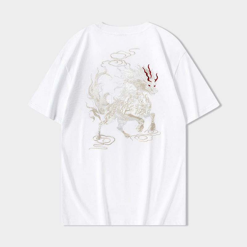 Man wearing black Qilin auspicious cloud graphic t-shirt in urban streetwear style | TeenStylo