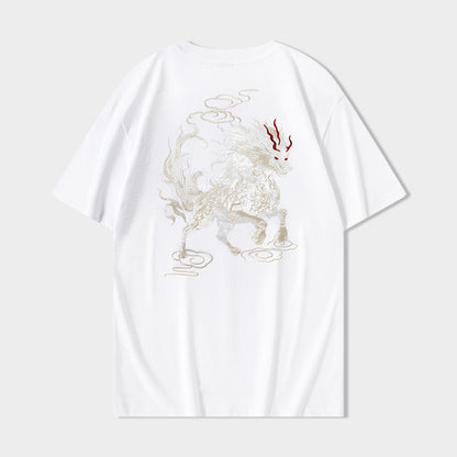 Man wearing black Qilin auspicious cloud graphic t-shirt in urban streetwear style | TeenStylo