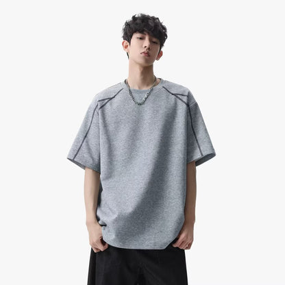Black men's loose short sleeve streetwear T-shirt front view – youth street style fashion at TeenStylo