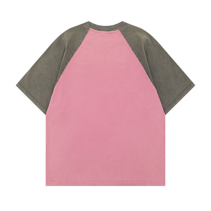 Pink retro color block mushroom letter print short detail close-up, Y2K streetwear style | TeenStylo