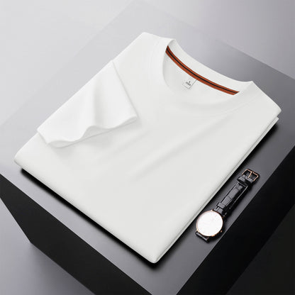 Man wearing champagne white round neck T-shirt in streetwear lifestyle look | TeenStylo