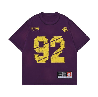 Dark purple unisex loose half sleeve t-shirt lifestyle shot, Y2K streetwear style | TeenStylo