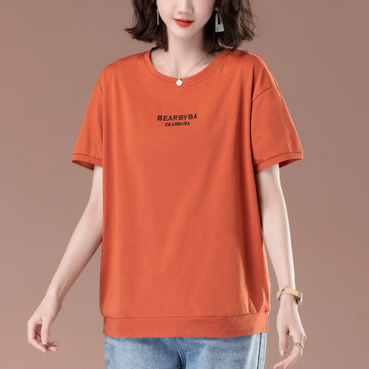 Orange red loose printed short sleeve t-shirt worn in casual lifestyle setting | TeenStylo