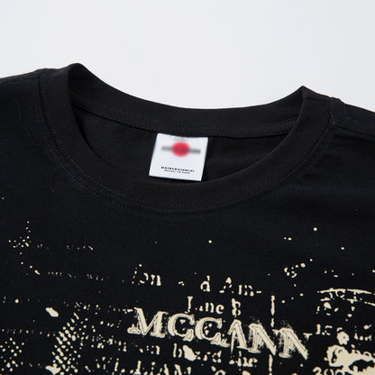White graffiti letter t-shirt with ink splatter detail closeup, streetwear style for teen boys | TeenStylo