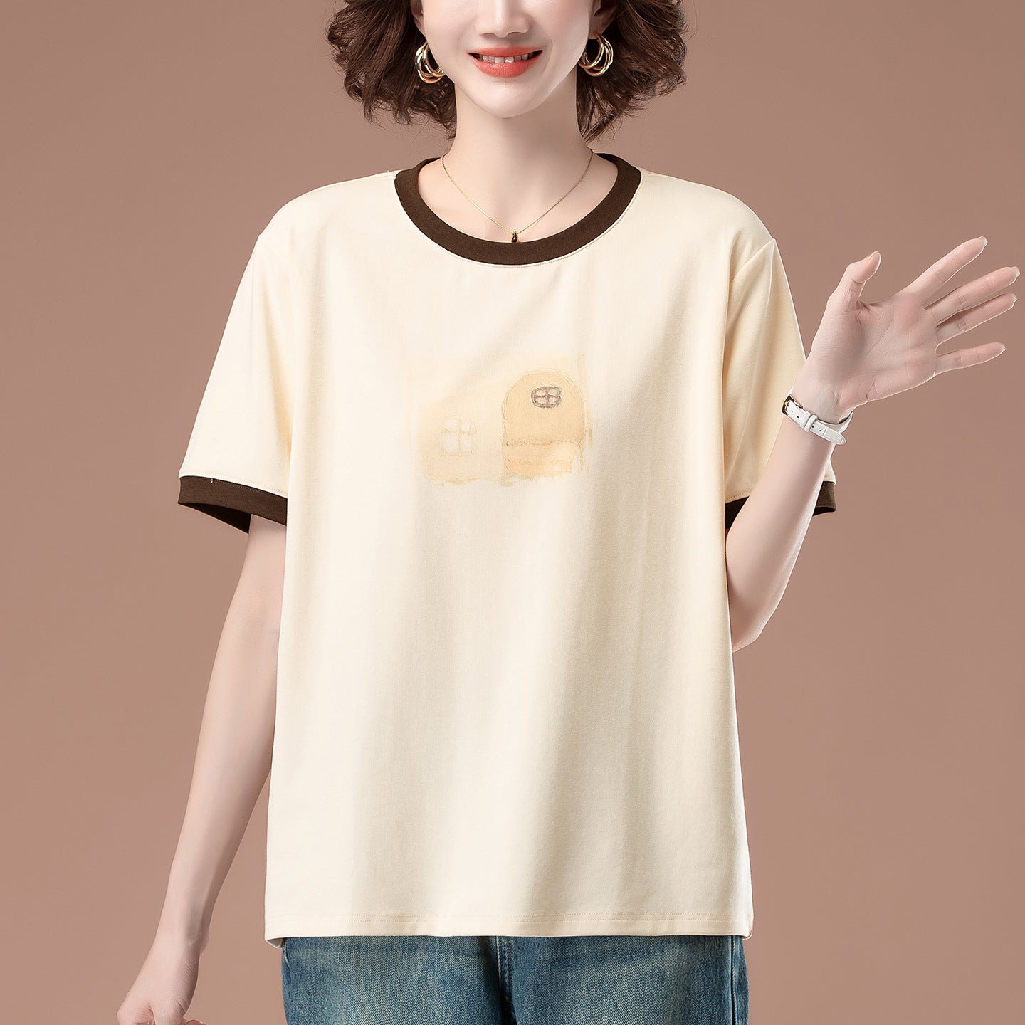 Apricot loose short sleeve tee worn as a casual streetwear lifestyle look for women at TeenStylo