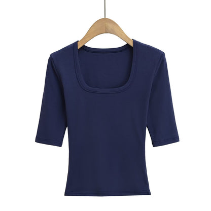 Navy blue unisex fitted U-neck mid-sleeve tee styled in a Y2K streetwear lifestyle look | TeenStylo