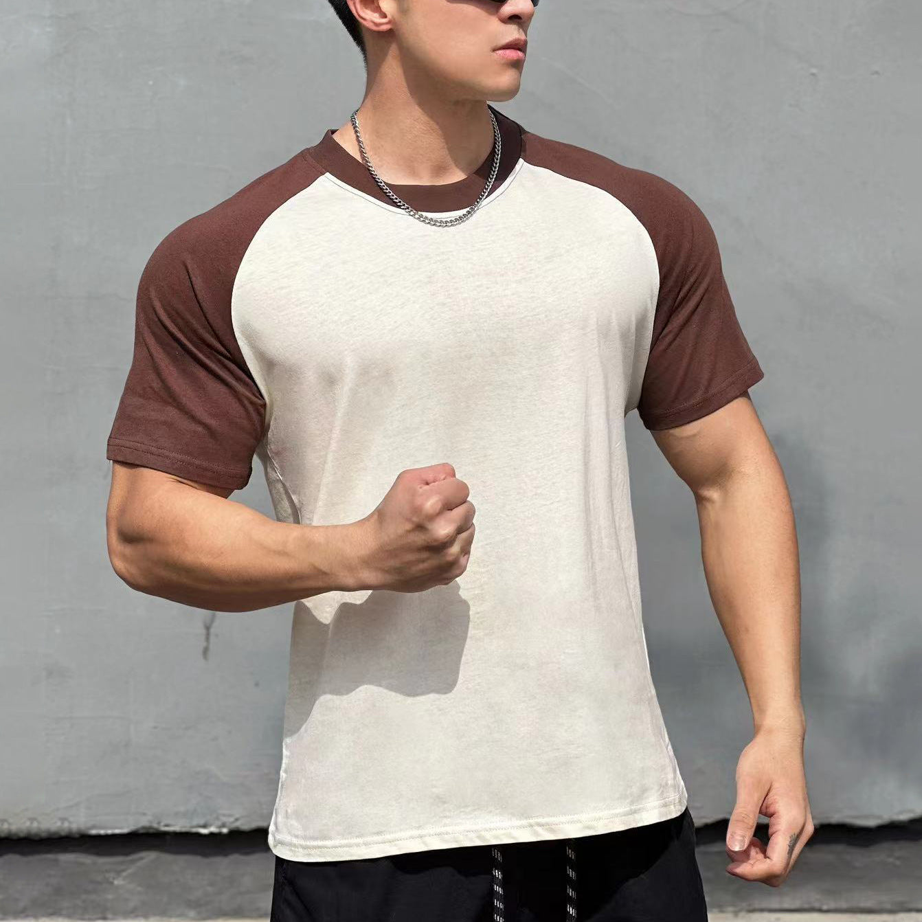 Men's navy blue color-blocked raglan sleeve T-shirt back view, streetwear style - TeenStylo