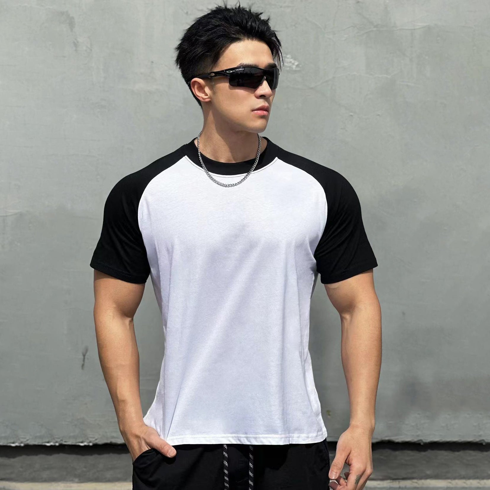 Men's white color-blocked raglan sleeve T-shirt streetwear style lifestyle look at TeenStylo