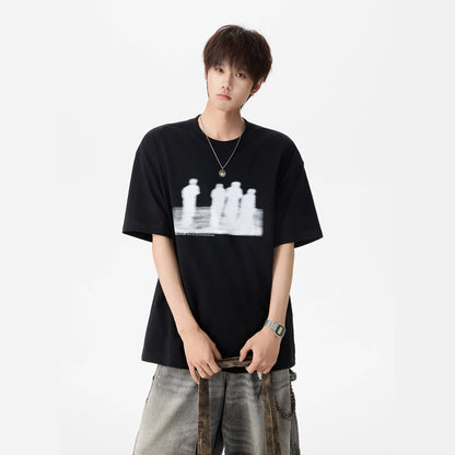 Men's black printed short sleeve t-shirt streetwear style worn casually, front view - TeenStylo