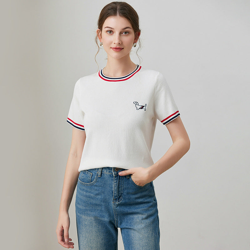 White embroidered detail close-up on women's loose short sleeve shirt | TeenStylo