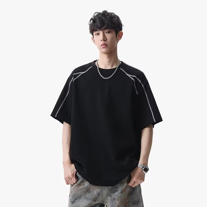 Black men's streetwear T-shirt detail close-up loose fit short sleeve youth style TeenStylo