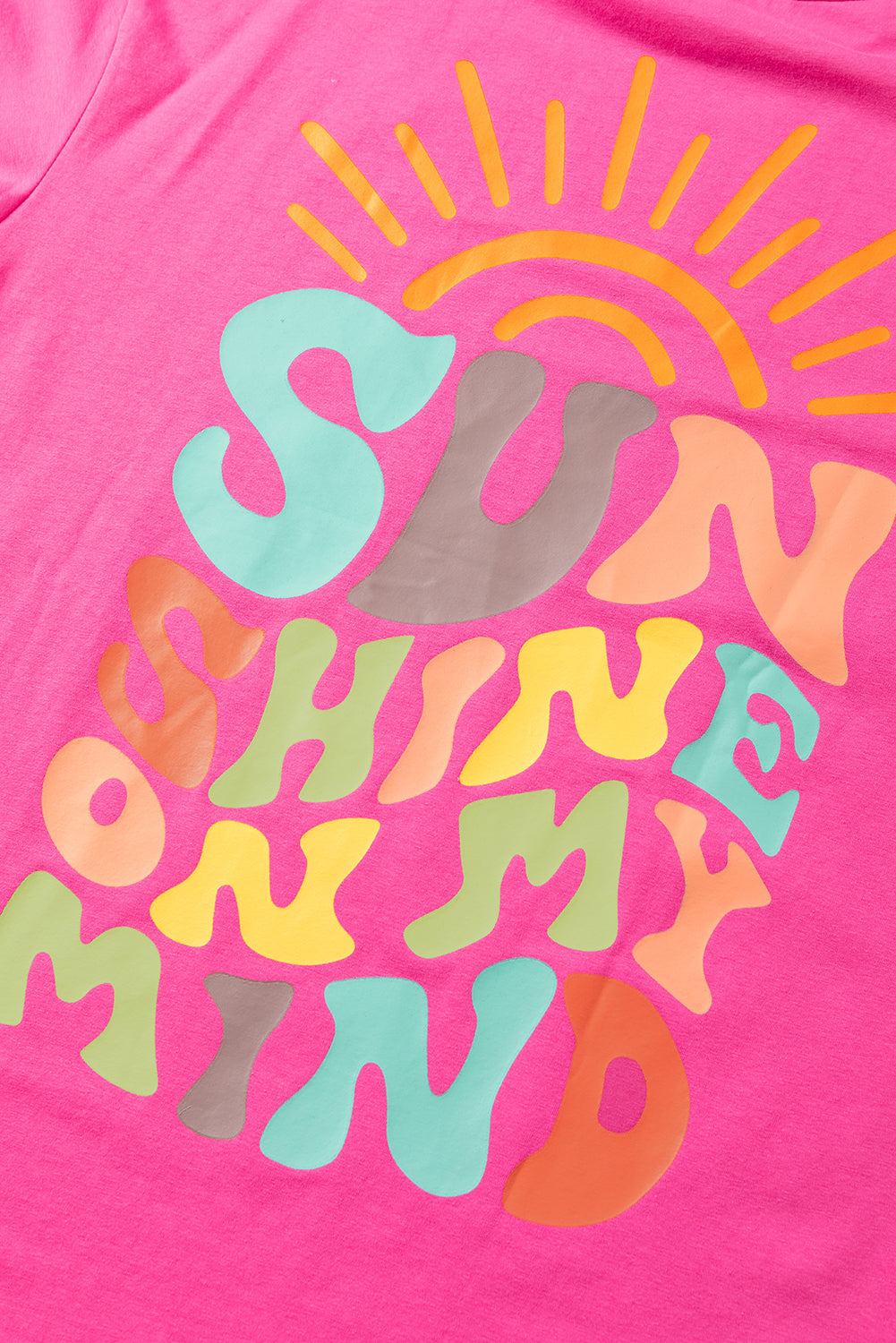 Bright pink SUNSHINE ON MY MIND graphic tee unisex streetwear Y2K style lifestyle shot TeenStylo