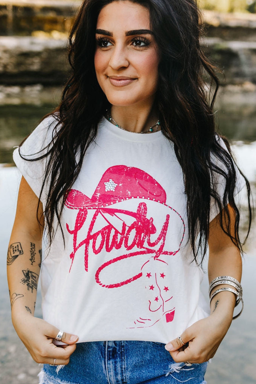 White rhinestone Howdy graphic tee back view with sparkling embellishments on white fabric – TeenStylo