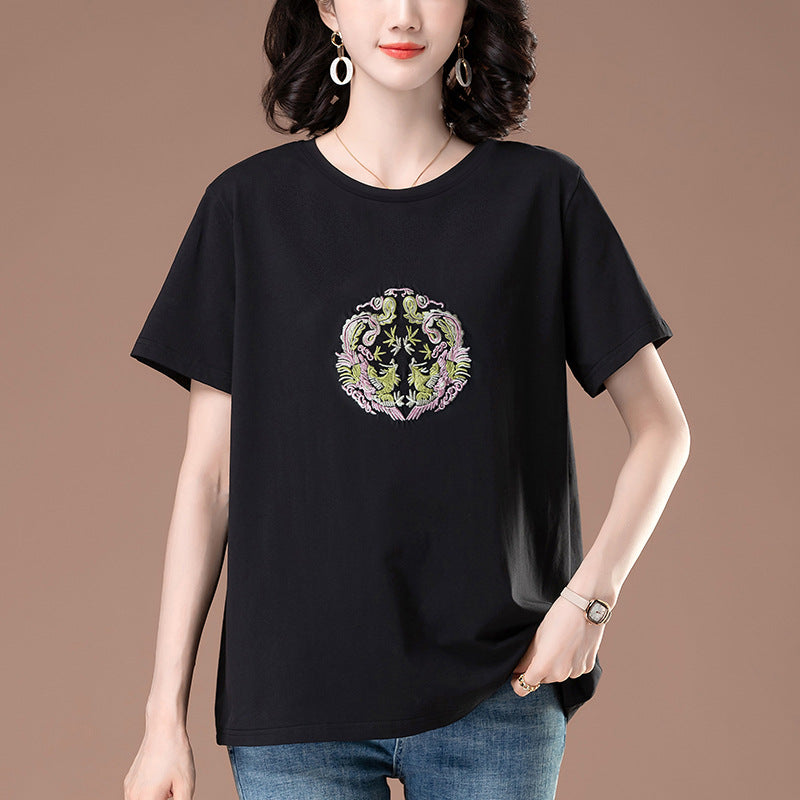 Black embroidered detail close-up on women's short sleeve T-shirt, gothic streetwear style | TeenStylo