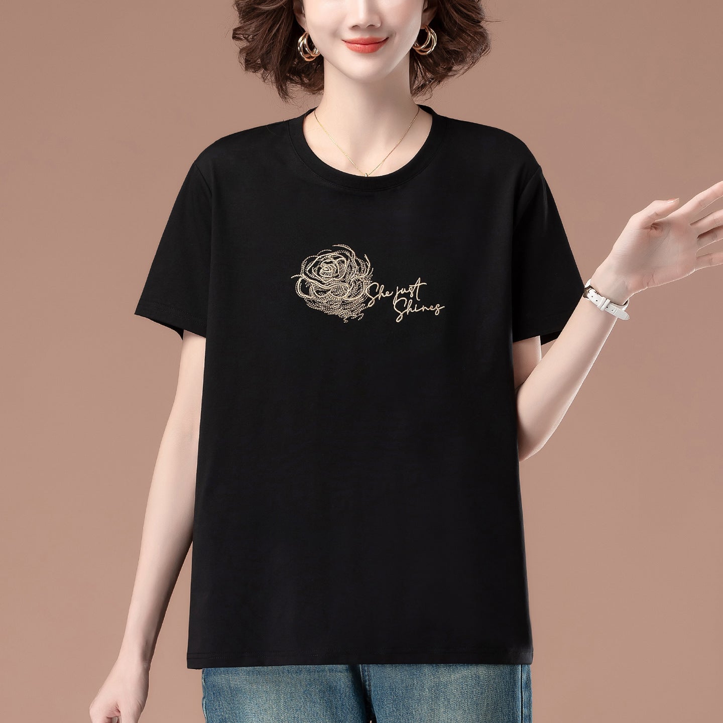 Black embroidered loose fit unisex T-shirt short sleeve lifestyle shot TeenStylo
