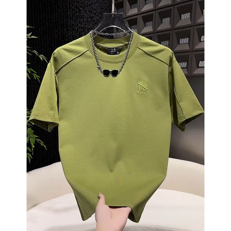 Men's heavyweight green casual short sleeve tee lifestyle shot - Y2K streetwear style at TeenStylo