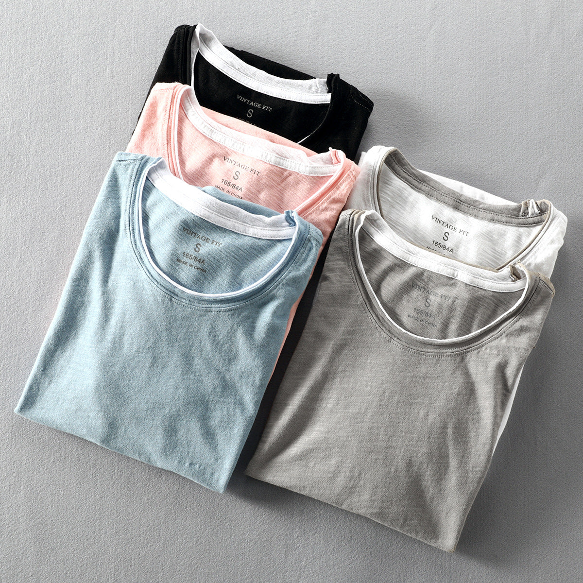 Man wearing light blue casual thin cotton t-shirt in streetwear lifestyle look - TeenStylo