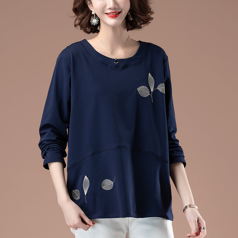 Royal blue embroidered detail close-up on women's long sleeve t-shirt, Y2K streetwear style | TeenStylo