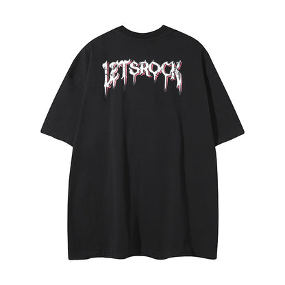 White streetwear t-shirt detail showing cartoon cat graffiti letter graphic print closeup - TeenStylo