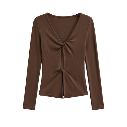 Brown women's V-neck long sleeve T-shirt fabric detail close-up, Y2K streetwear style | TeenStylo