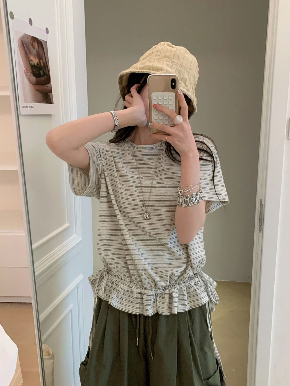 Beige striped ruffled short sleeve women's t-shirt lifestyle shot - Y2K streetwear fashion at TeenStylo
