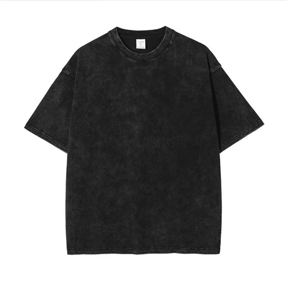 Plain black men's short sleeve streetwear t-shirt lifestyle shot - TeenStylo