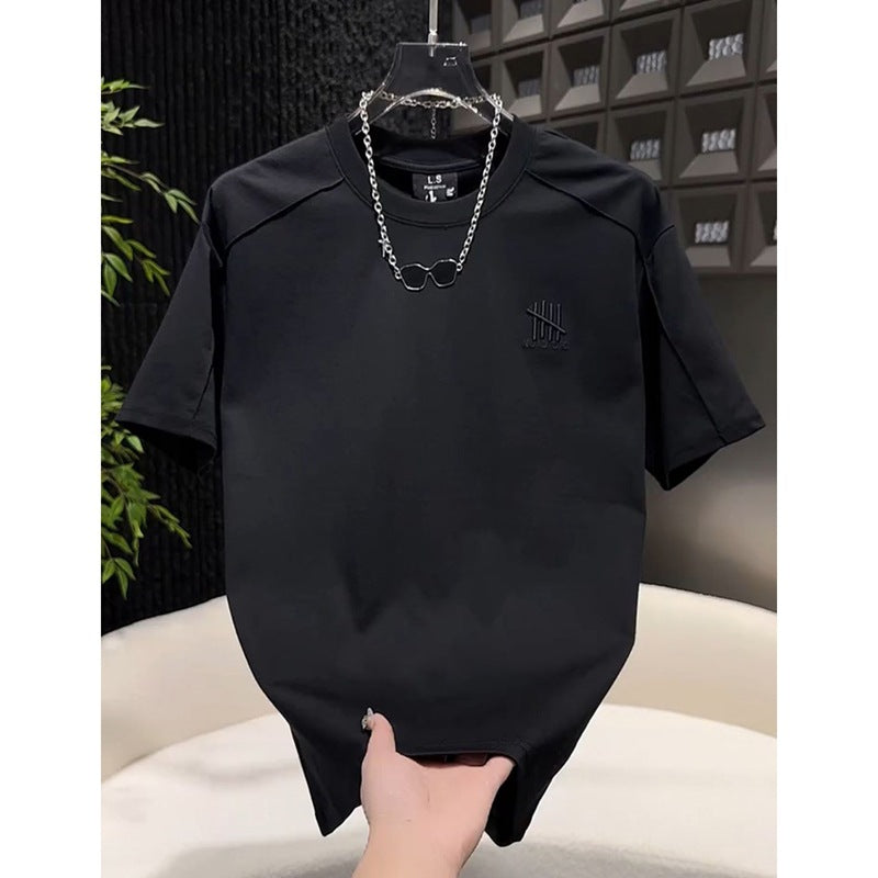 Black heavyweight casual short sleeve tee lifestyle shot - men's solid color streetwear essential | TeenStylo