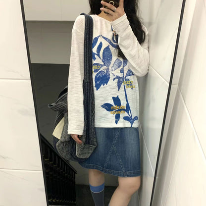 Retro unisex long sleeve t-shirt lifestyle shot, Y2K streetwear style for women, TeenStylo