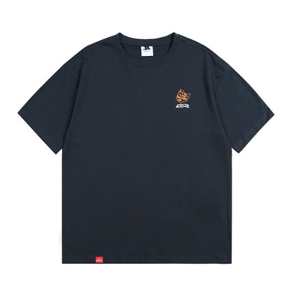 Navy blue unisex loose printed short sleeve T-shirt lifestyle shot – Y2K streetwear style | TeenStylo