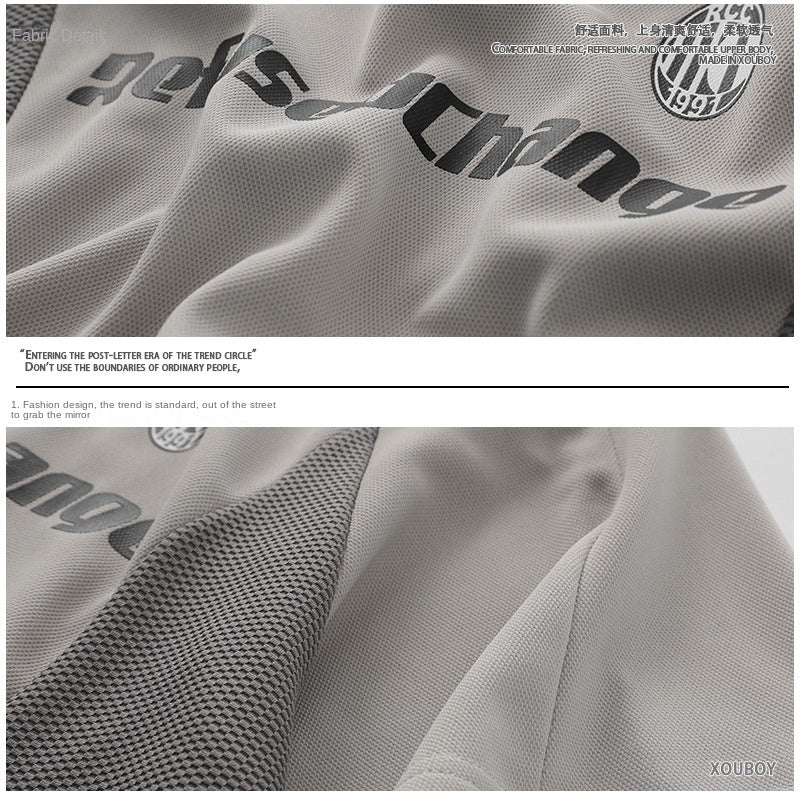 Gray men's loose motorcycle t-shirt worn in casual streetwear lifestyle setting | TeenStylo