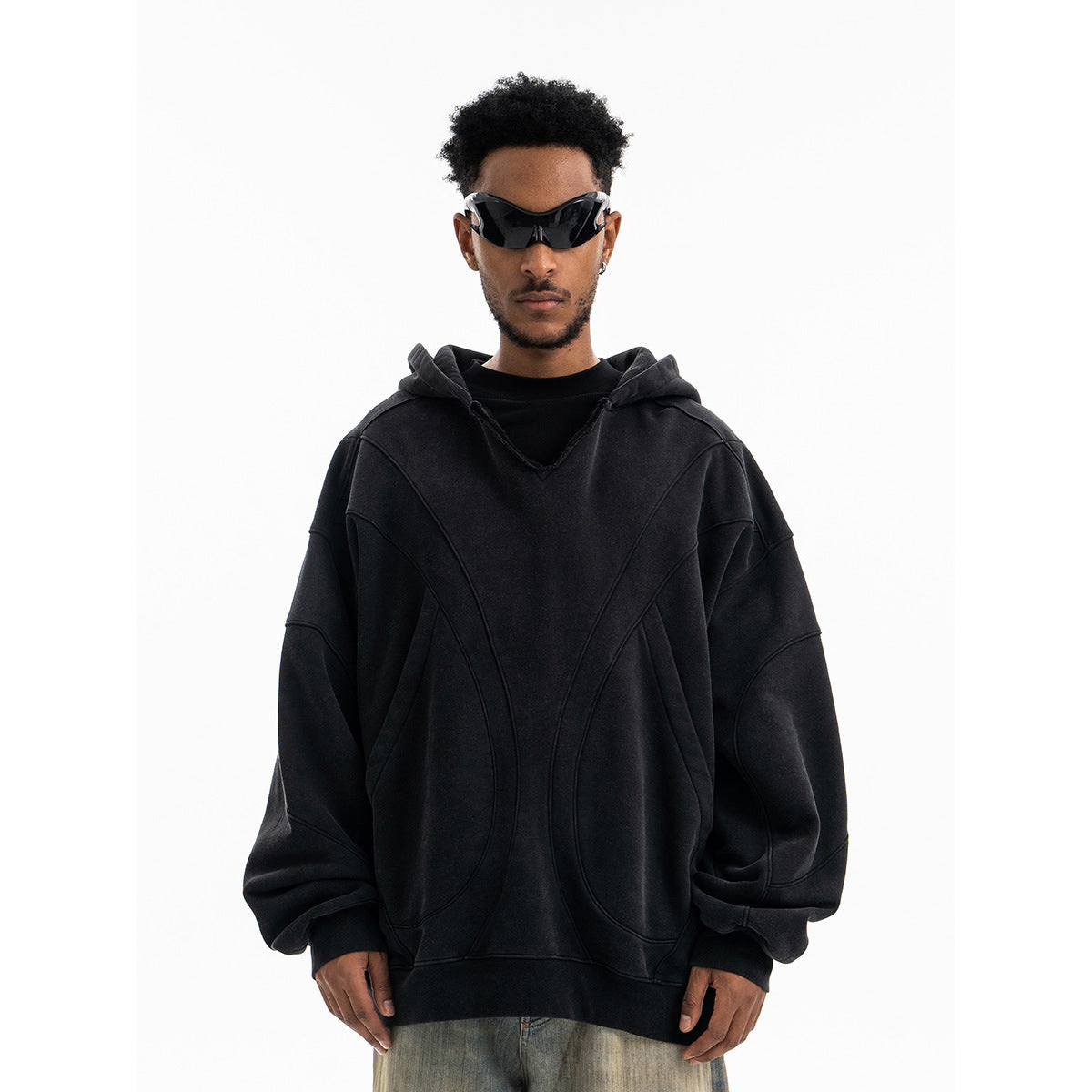 Black oversized patchwork hoodie back view with deconstructed detailing for men - TeenStylo