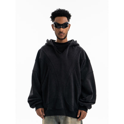Black oversized patchwork hoodie back view with deconstructed detailing for men - TeenStylo