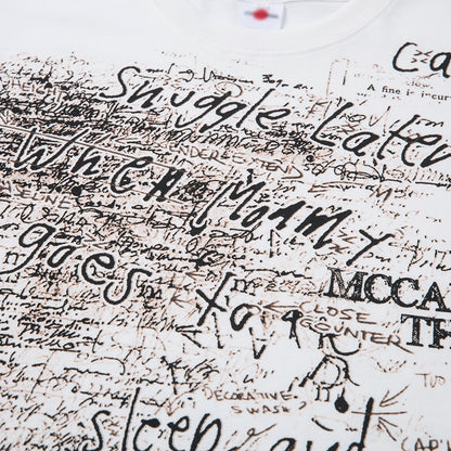 Male model wearing white heavyweight vintage graffiti loose short sleeve tee streetwear lifestyle shot TeenStylo