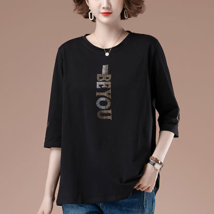 Black loose seven quarter sleeve T-shirt close-up detail, Y2K streetwear unisex fashion | TeenStylo
