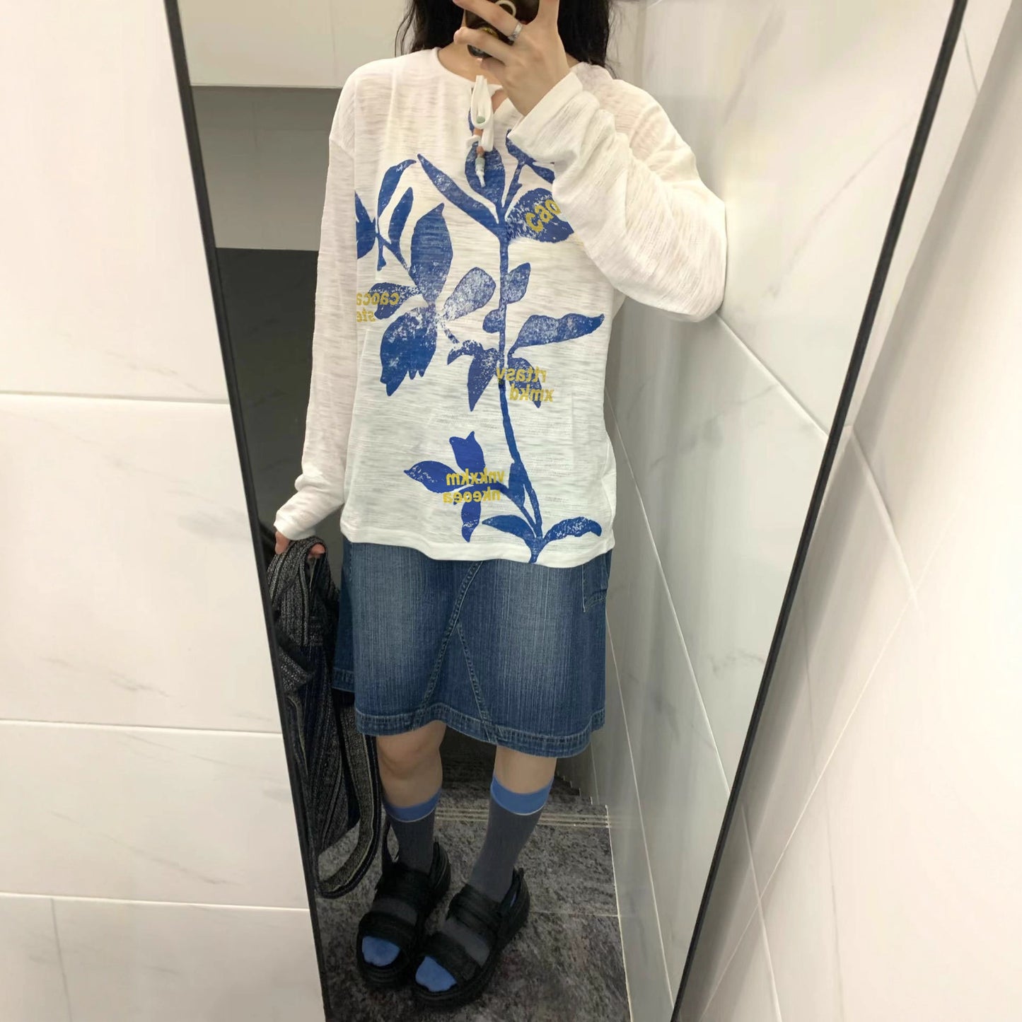 Retro long sleeve t-shirt styled in a lifestyle setting for women, streetwear aesthetic at TeenStylo