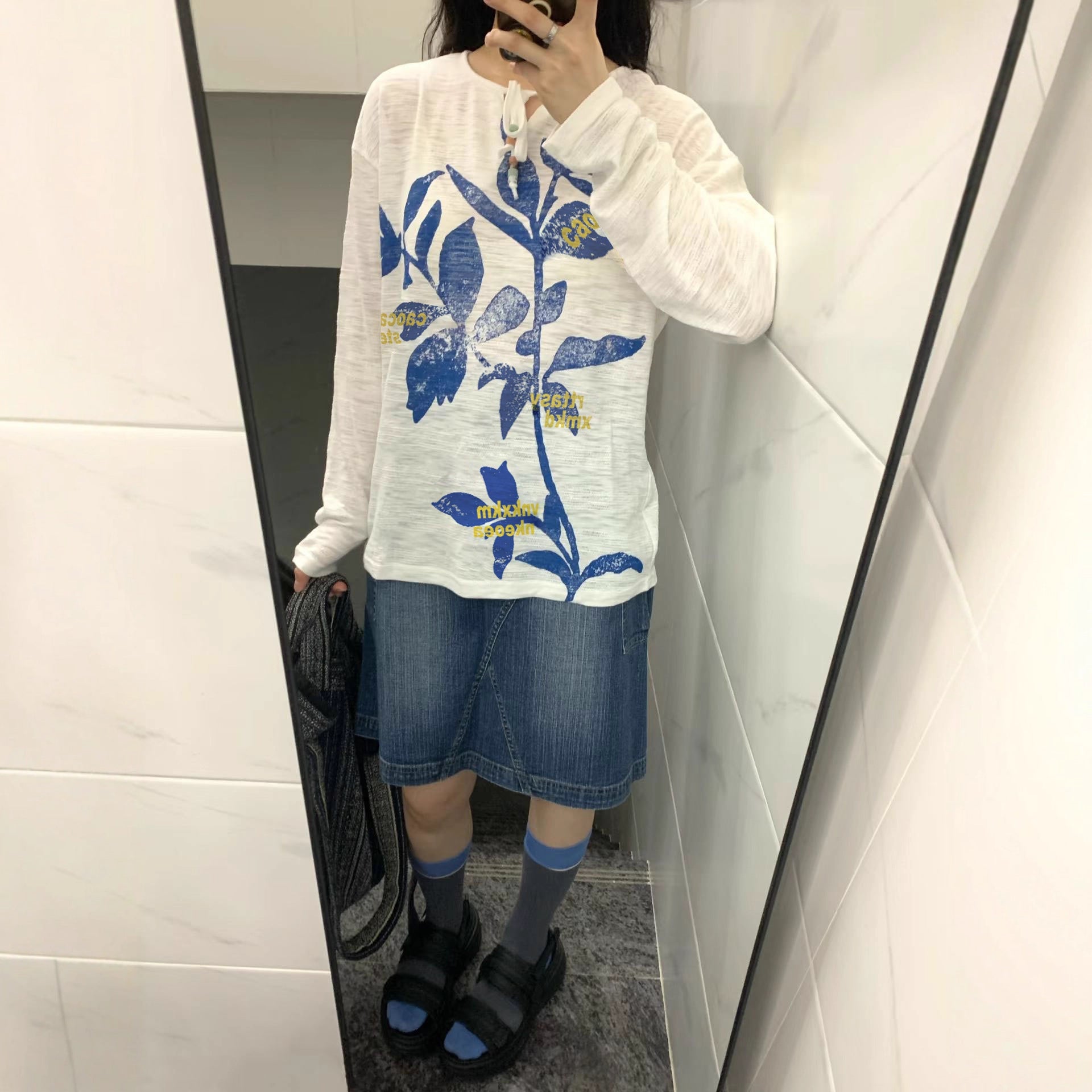 Retro long sleeve t-shirt styled in a lifestyle setting for women, streetwear aesthetic at TeenStylo