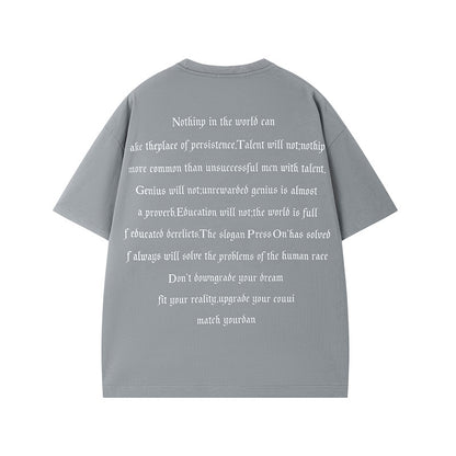 Man wearing black letter print heavyweight round neck t-shirt in streetwear style - TeenStylo