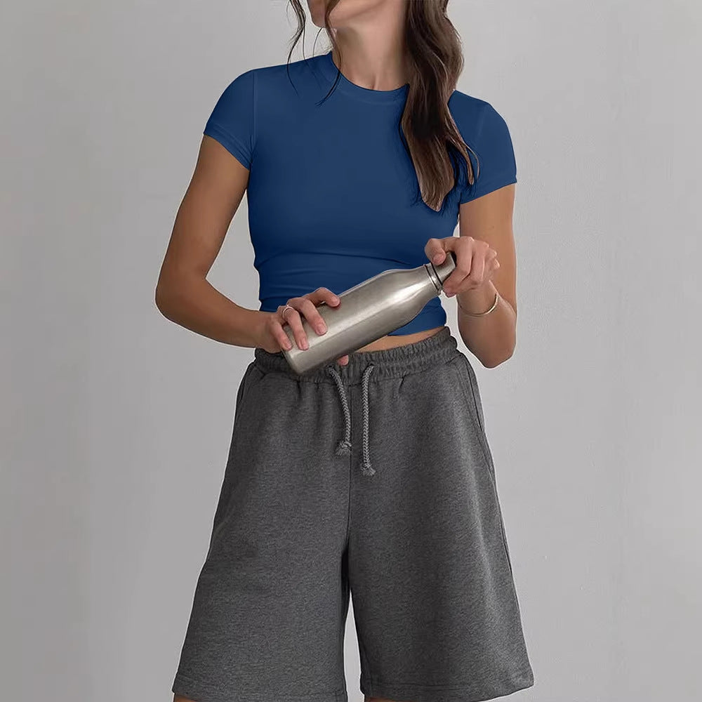 Blue slim fit short sleeve women's T-shirt lifestyle shot - Y2K streetwear style | TeenStylo