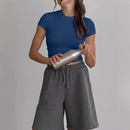Blue slim fit short sleeve women's T-shirt lifestyle shot - Y2K streetwear style | TeenStylo
