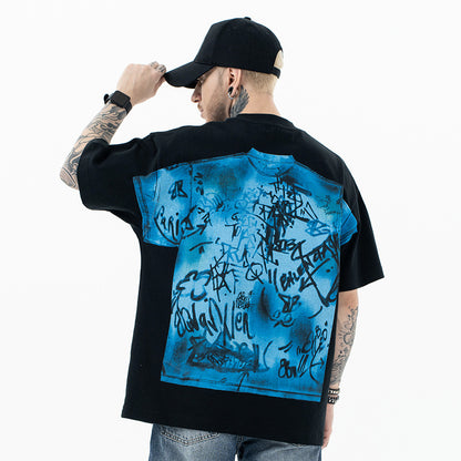 White men's streetwear loose fit t-shirt fabric detail close-up, casual urban style short sleeve tee | TeenStylo
