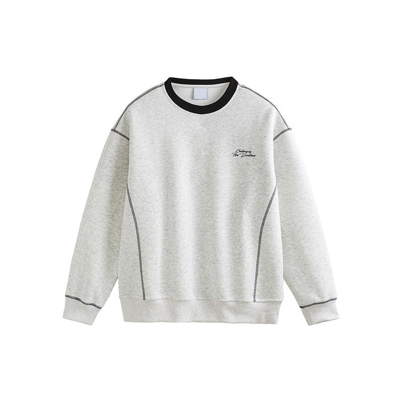 Men's red sweatshirt with white flower grey embroidered design, streetwear style lifestyle shot | TeenStylo