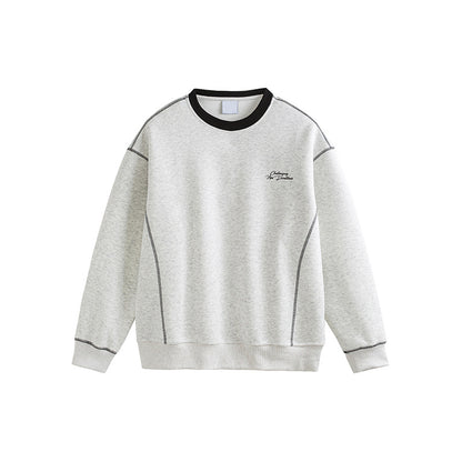 Men's red sweatshirt with white flower grey embroidered design, streetwear style lifestyle shot | TeenStylo
