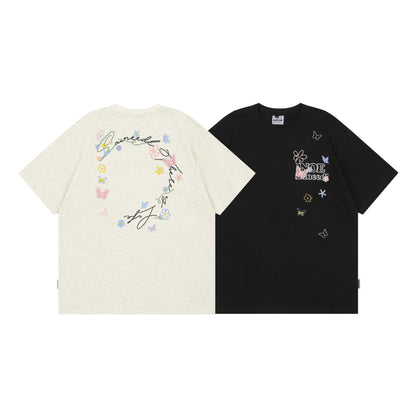 Black butterfly floral letter embroidery short sleeve unisex tee lifestyle shot - TeenStylo