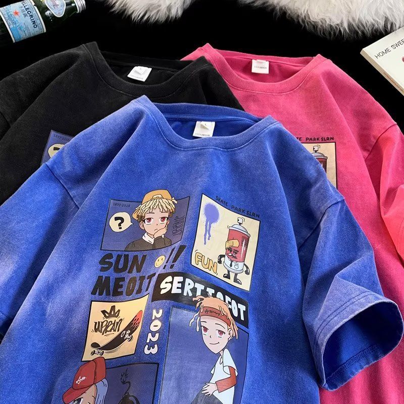 Blue anime cartoon graphic tee worn casually by male model, short sleeve summer streetwear style - TeenStylo