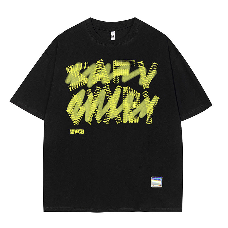 Black green oversized streetwear couple tee worn in urban lifestyle setting, unisex Y2K street fashion at TeenStylo